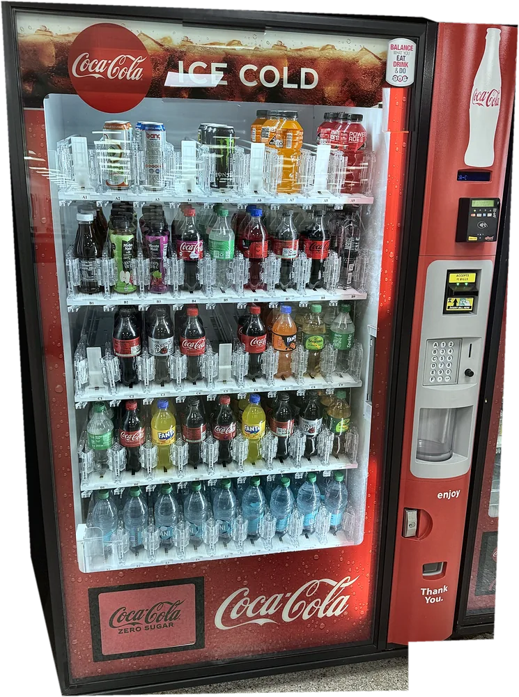 Coca-Cola machine full of bottled sodas, Monster, Powerade, Minute Maid juices and water.